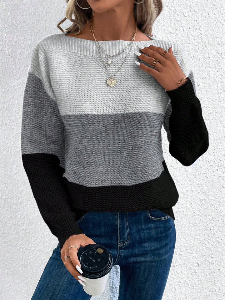 Schwarzer Strickpullover im Patchwork-Design